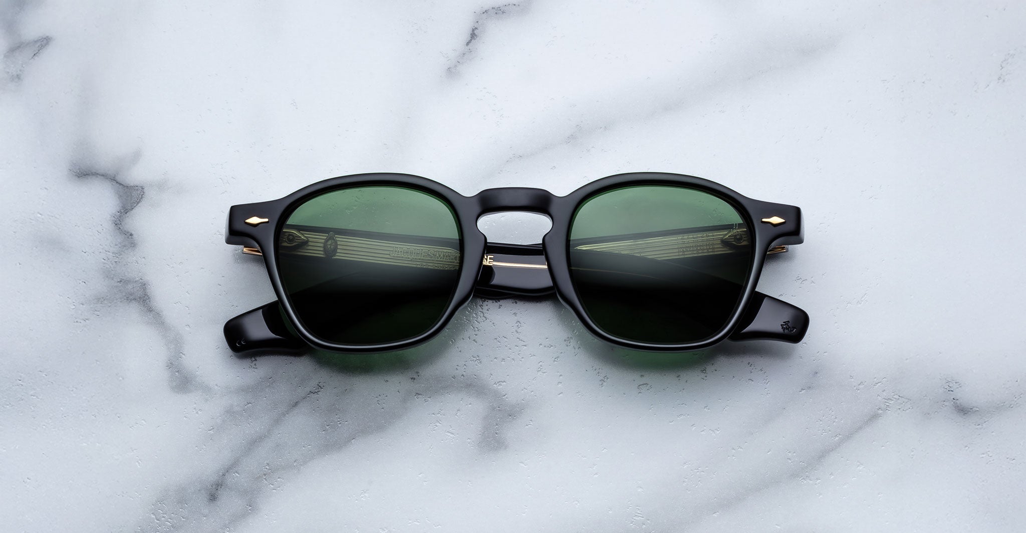 Jacques Marie Mage Zephirin 47 black sunglasses with green lenses, top view showing full frame and lens color.