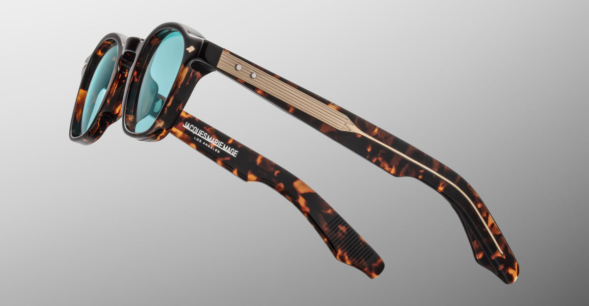 Jacques Marie Mage Zephirin sunglasses in Aegen, side detail showing tortoiseshell acetate temples and gold-tone hardware.