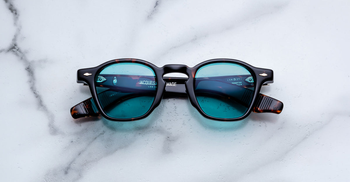 Jacques Marie Mage Zephirin sunglasses in Aegen, front view with turquoise lenses and dark tortoiseshell acetate frame.
