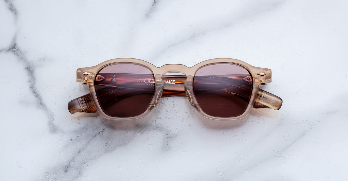 Jacques Marie Mage Zephirin sunglasses in Casliza, front view with translucent amber acetate and rose-tinted lenses.