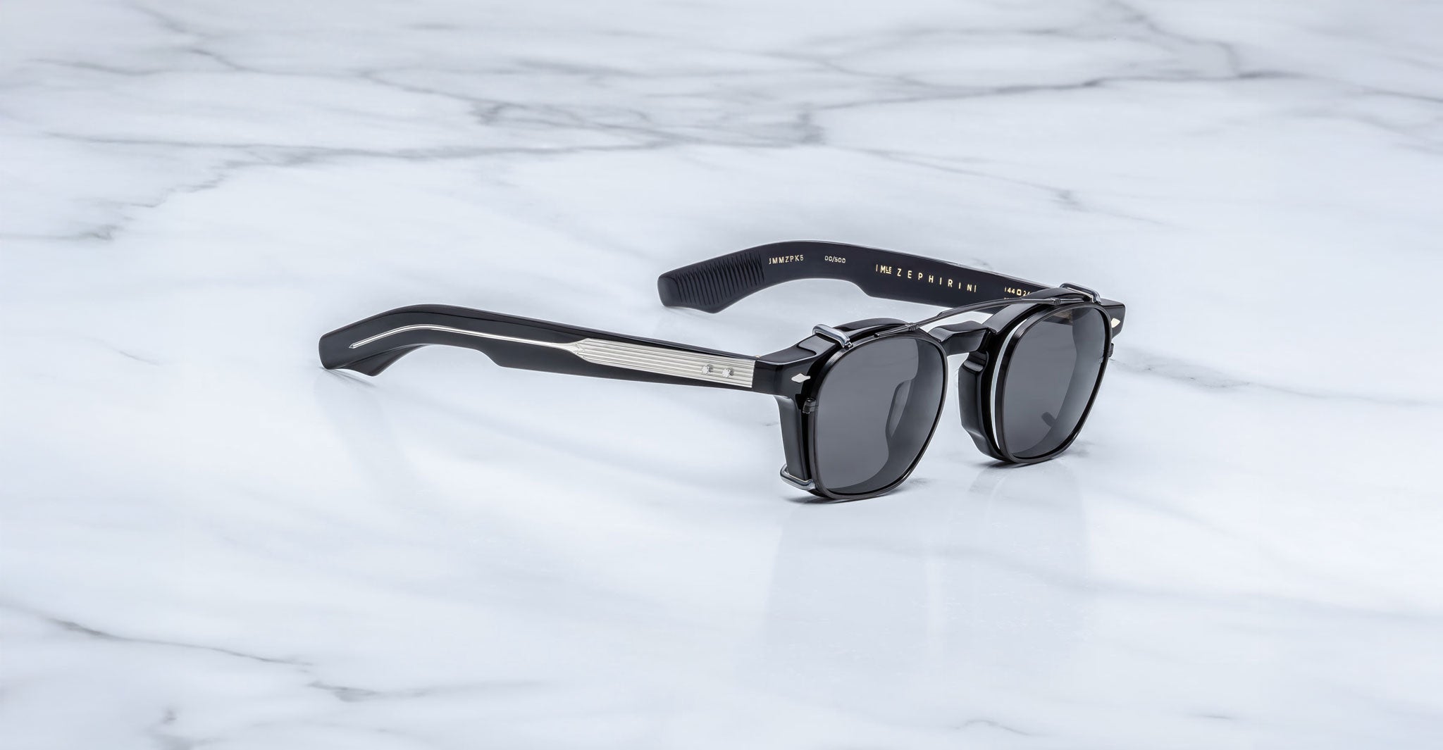 Jacques Marie Mage Zephirin Clip On 2 round sunglasses with thick frames, viewed from above.