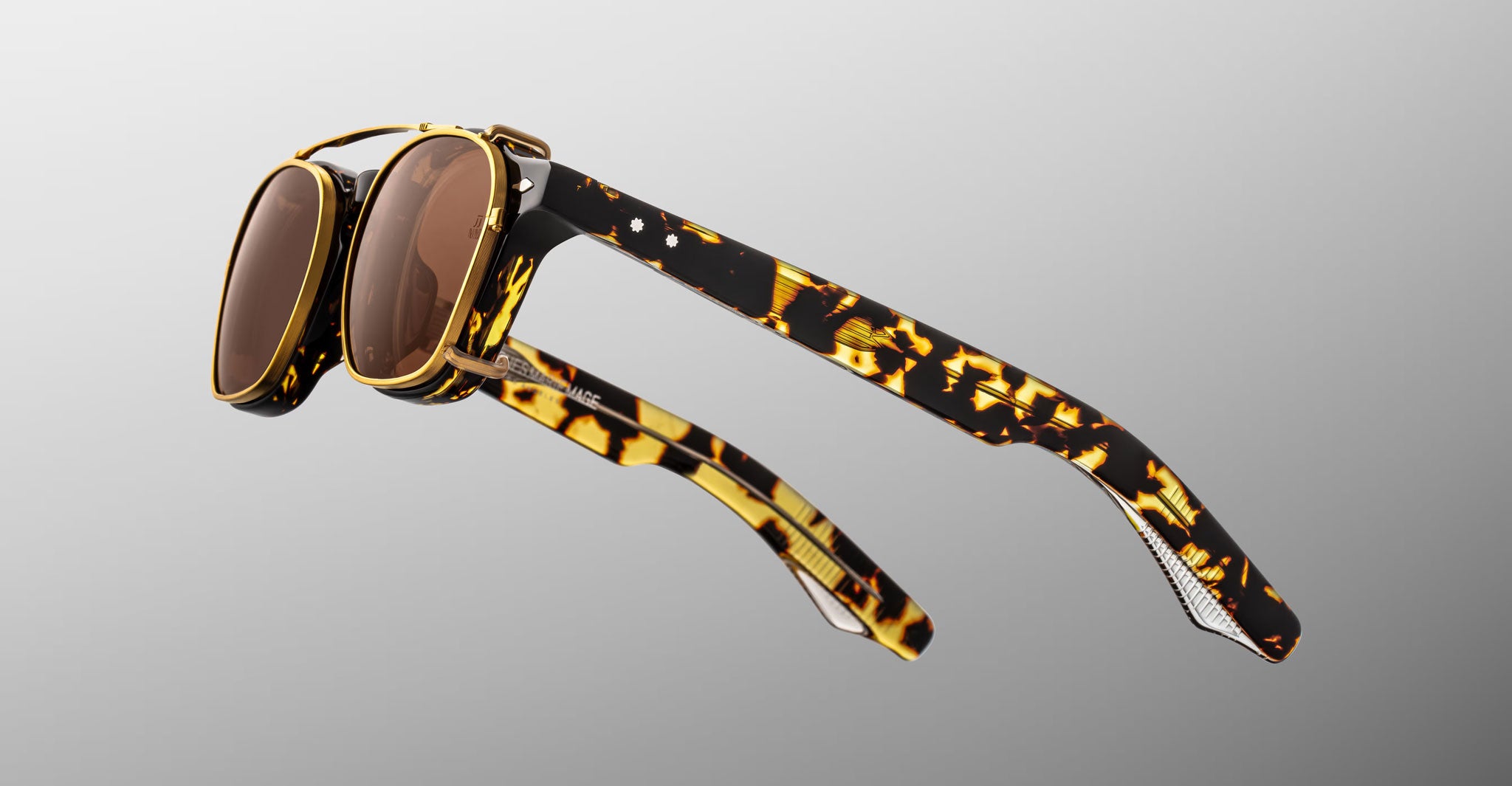 Jacques Marie Mage Zephirin Clip On 2 sunglasses, brown tortoiseshell frames, gold accents, brown lenses, front view.