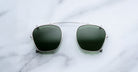 Jacques Marie Mage Zephirin Clip On 2 sunglasses with thin metal frame, shown from above.