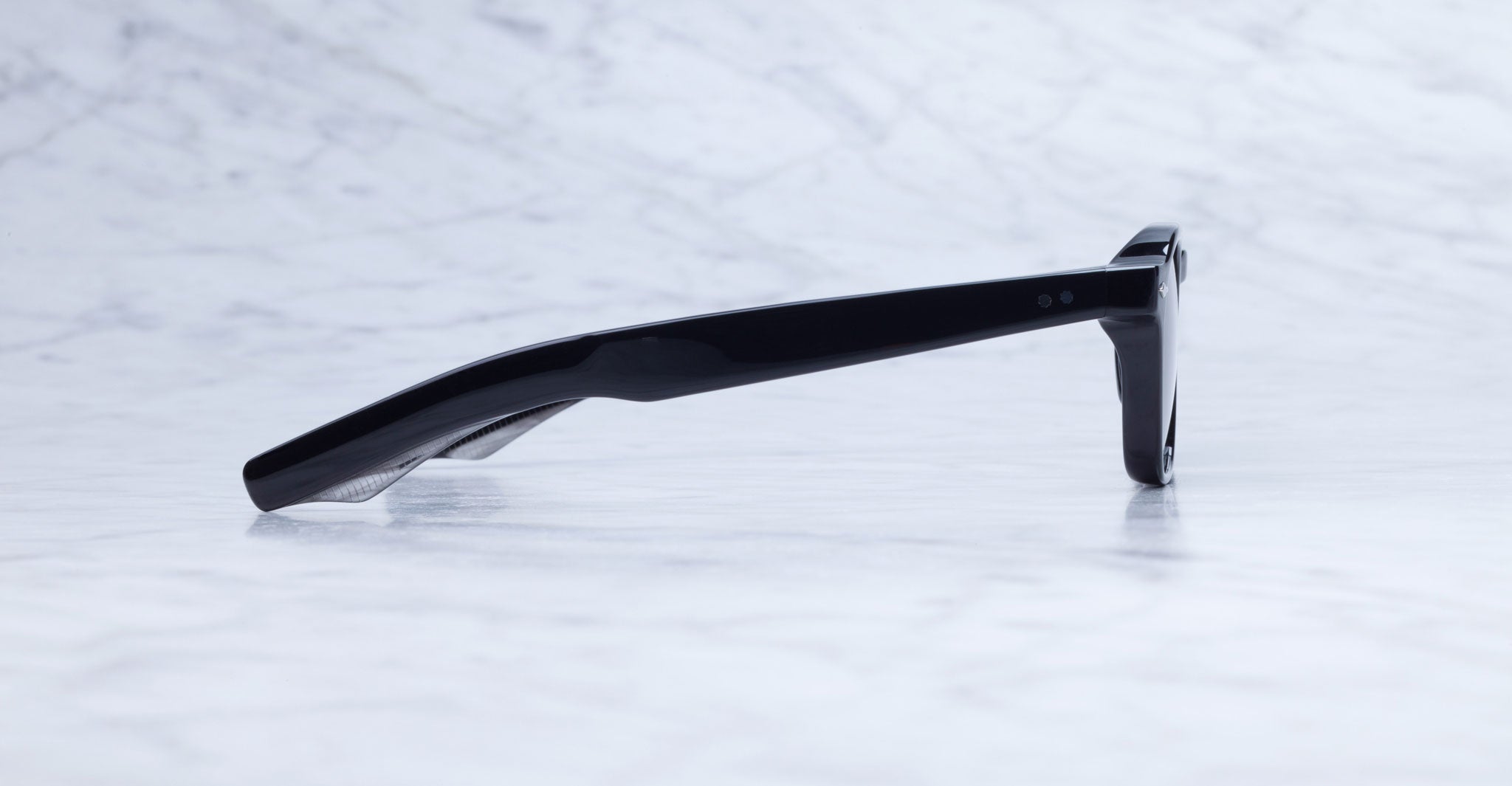 Jacques Marie Mage Zephirin eyeglasses, side profile view with folded arms, model name visible.