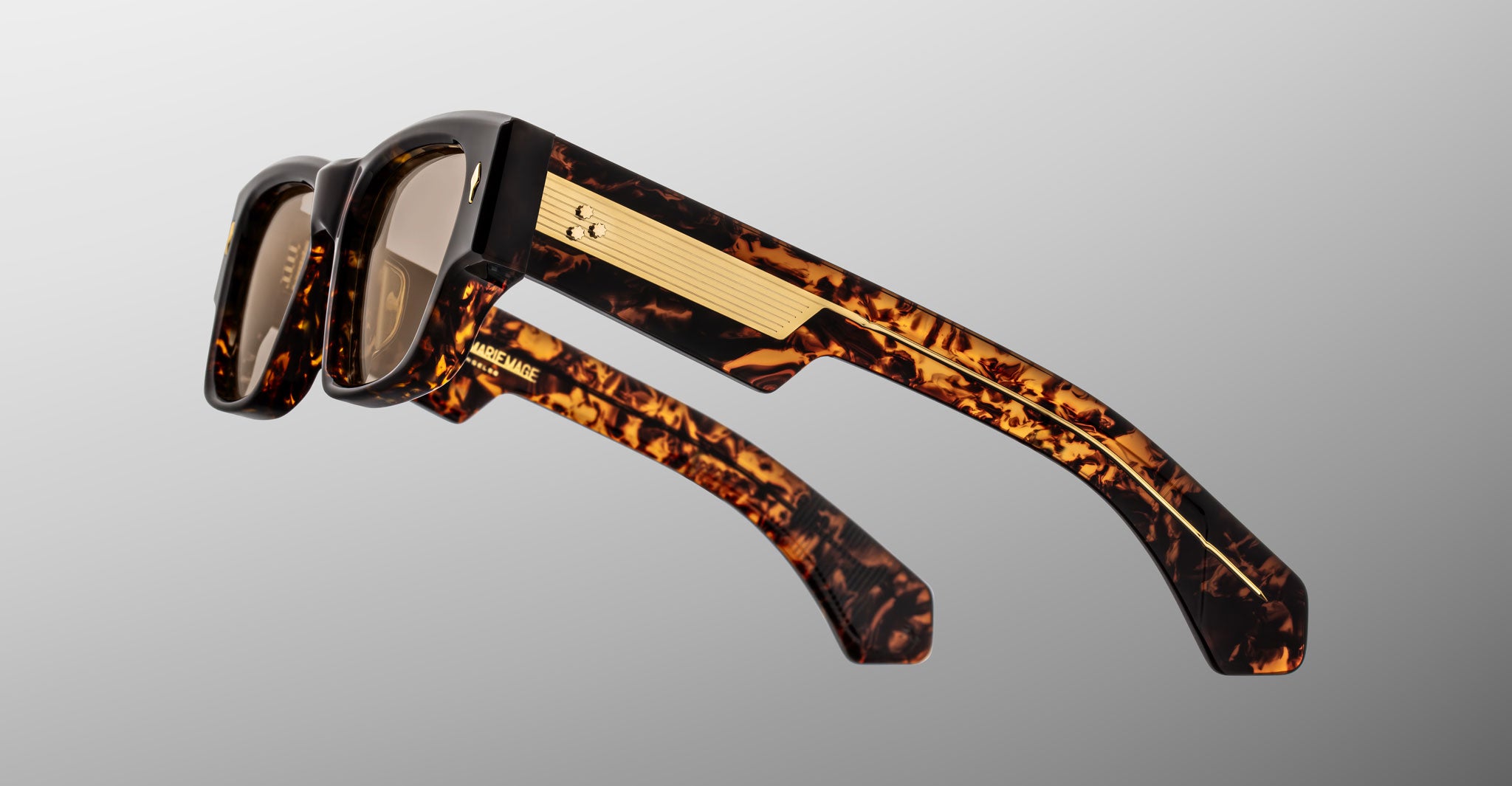 Jacques Marie Mage Zimmerman sunglasses in tortoise acetate featuring bold rectangular frame, warm tinted lenses, and wide temples with signature metal core detail, side view