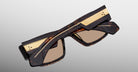 Jacques Marie Mage Zimmerman sunglasses in tortoise acetate with bold rectangular frame, warm tinted lenses, and wide temples with exposed gold tone metal core detail, back view