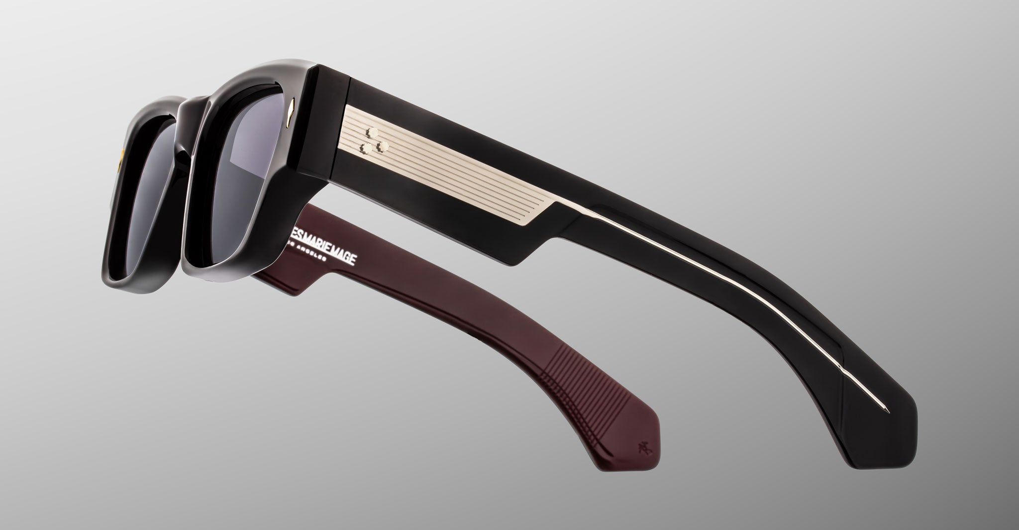 Jacques Marie Mage Zimmerman sunglasses in Bloodstone black acetate with bold rectangular frame, dark tinted lenses, and wide temples with signature metal core detail, side view