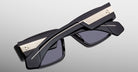 Jacques Marie Mage Zimmerman sunglasses in Bloodstone black acetate with bold rectangular frame, dark tinted lenses, and wide temples with signature metal core detail, back view