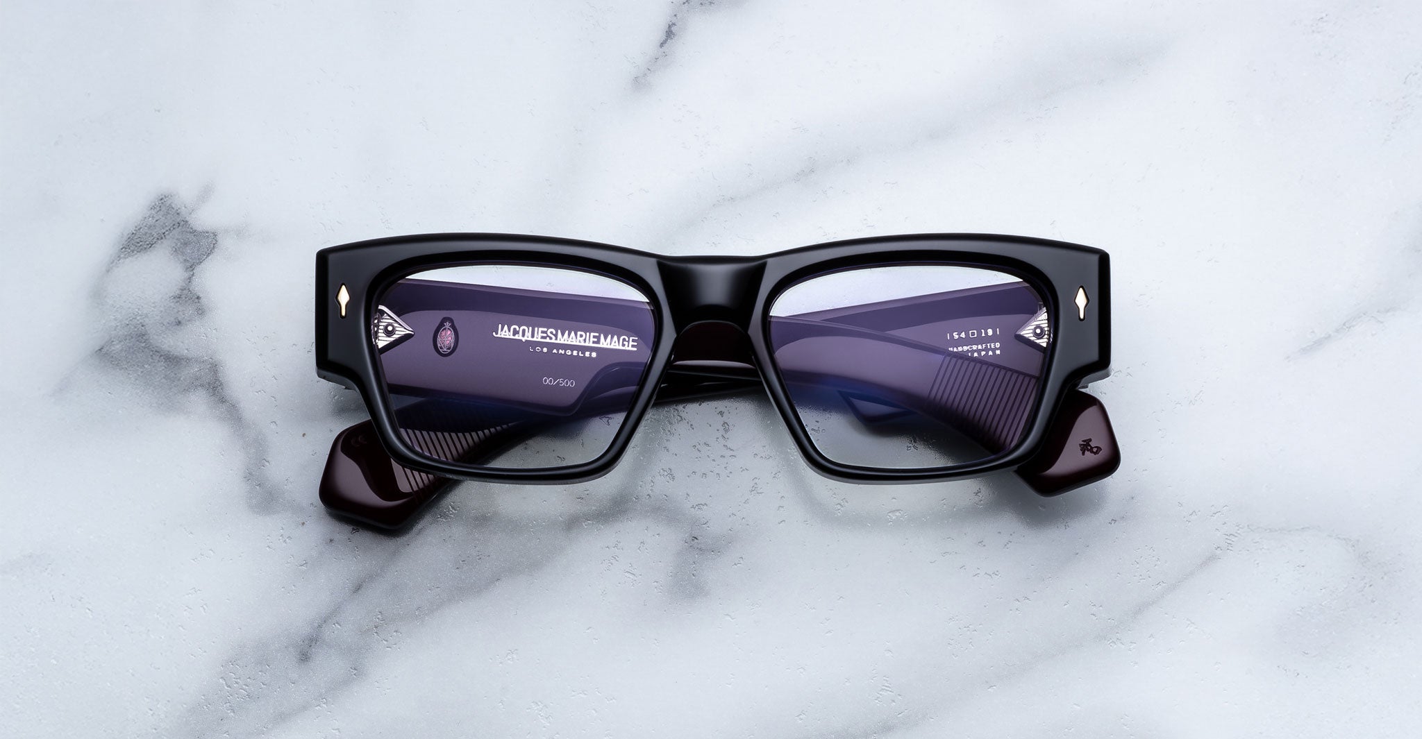 Jacques Marie Mage Zimmerman optical glasses in Bloodstone black acetate with bold rectangular frame, clear lenses, and signature arrowhead front pins, front view