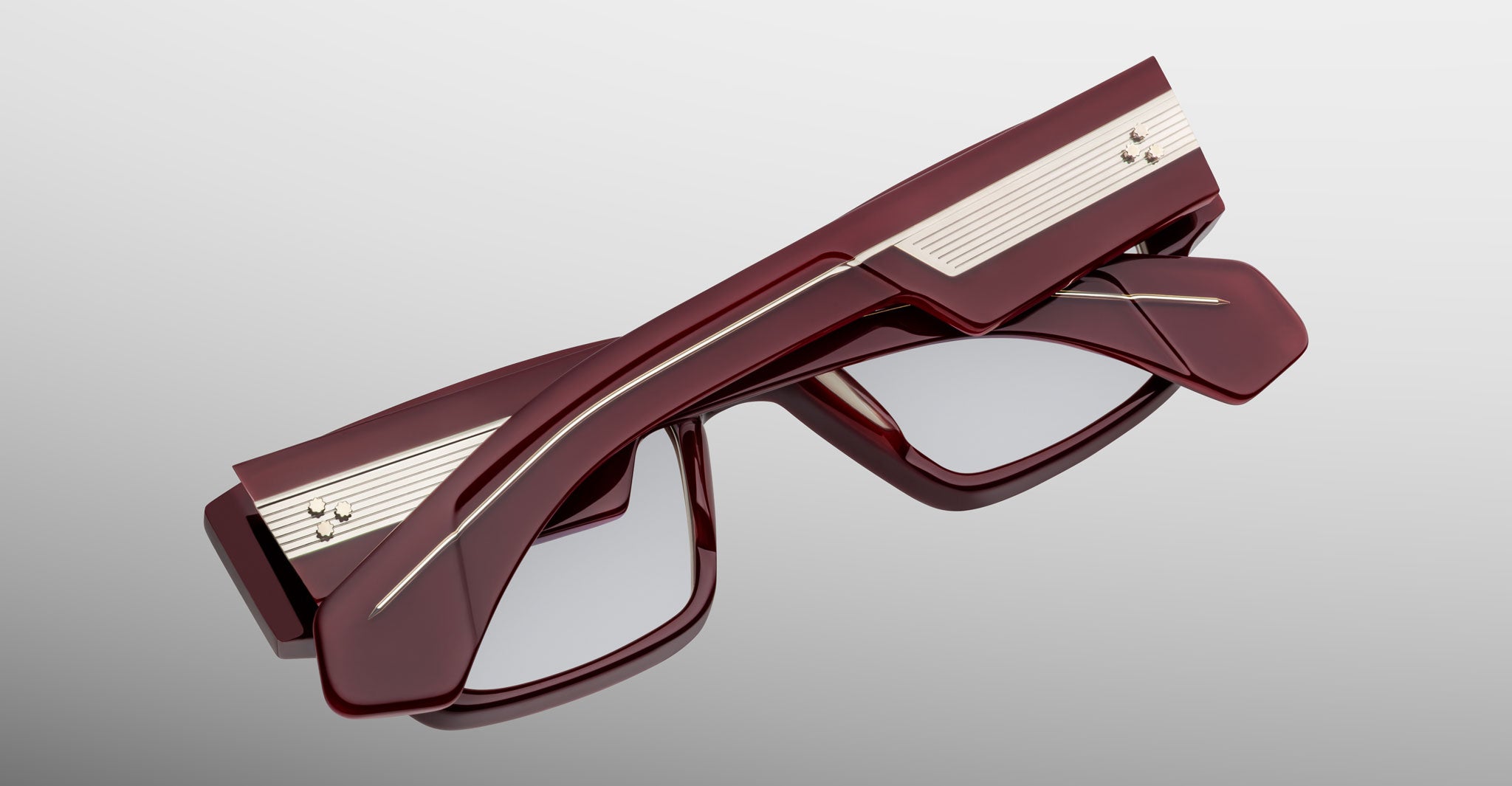 Jacques Marie Mage Zimmerman optical glasses in Bordeaux Empire red acetate with bold rectangular frame, clear lenses, and wide temples with signature metal wirecore detail, back view