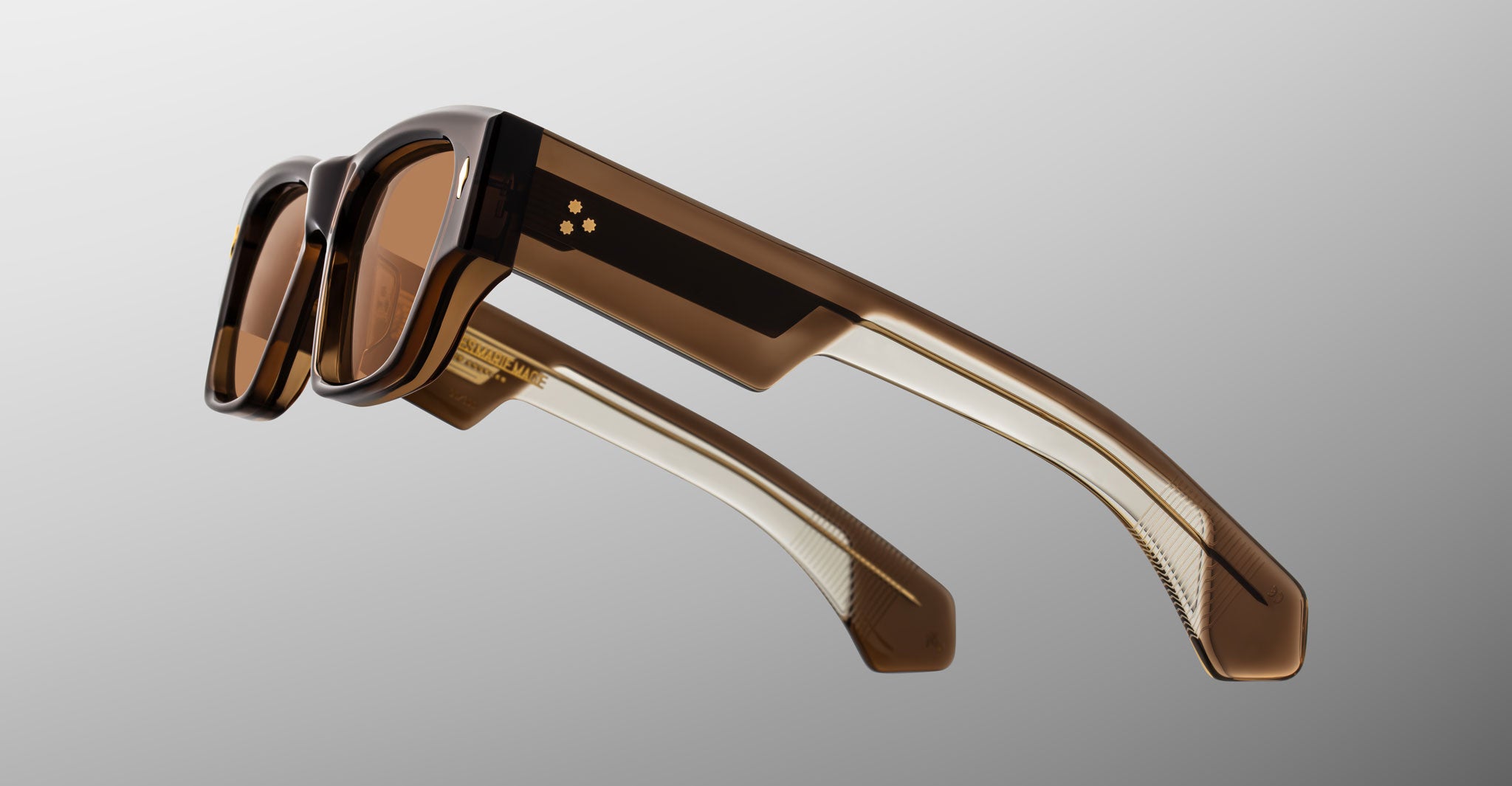 Jacques Marie Mage Zimmerman sunglasses in London brown acetate with bold rectangular frame, brown tinted lenses, and wide temples with signature metal core detail, side view