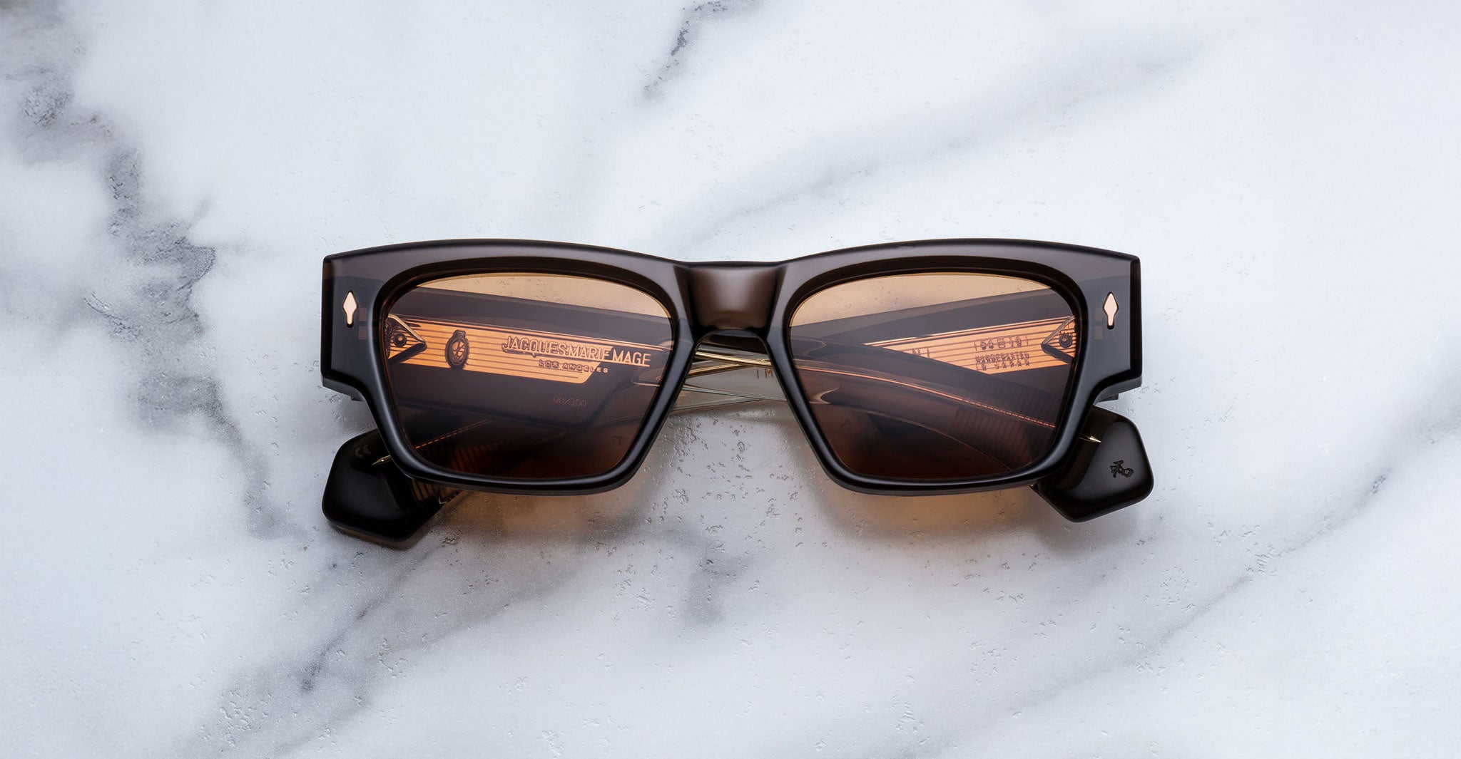Jacques Marie Mage Zimmerman sunglasses in London brown acetate with bold rectangular frame, brown tinted lenses, and signature arrowhead front pins, front view