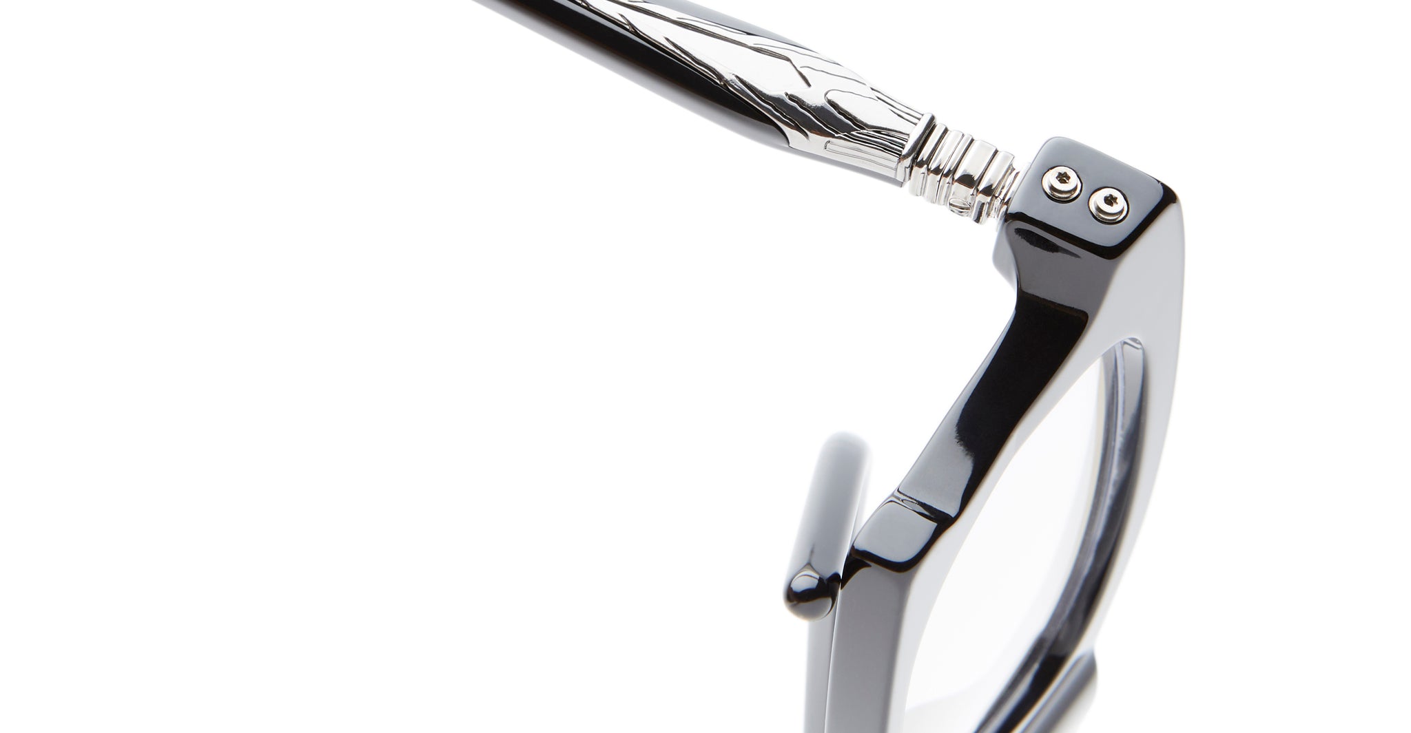 Close-up of the Kuboraum D75 eyeglass frame in black and silver, highlighting its shiny metal hinge and decorative temple against a white background.