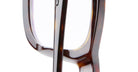 Close-up of the Kuboraum D75 temples and frame in tortoiseshell, set against a white background, highlighting the glossy brown and amber patterns.