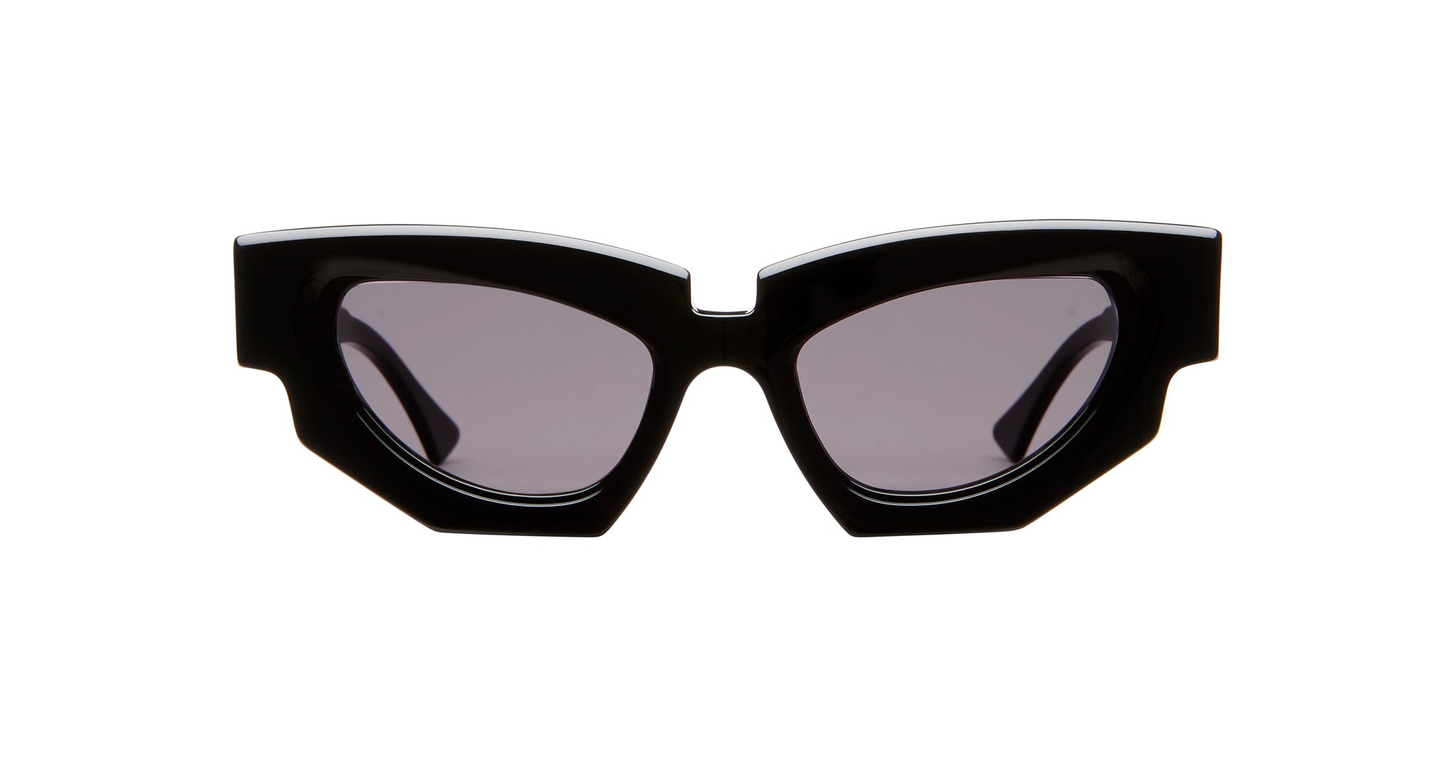 The Kuboraum F5 sunglasses feature black geometric frames with thick, angular design and dark tinted lenses, shown on a white background.