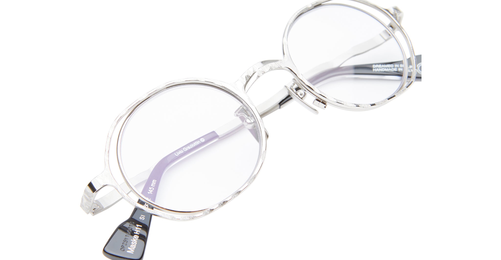 Kuboraum H11 round eyeglasses with transparent frames and subtle purple-tinted temples are displayed angled on a white background, featuring the brand tag on one arm.