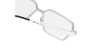 Close-up of the temple and corner of Kuboraum H15 silver metal eyeglasses with rectangular lenses and clear nose pads, set against a white background.