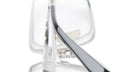 A close-up of Kuboraum H15 eyeglasses featuring thin silver metal frames and black arms, photographed against a white background.