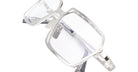 The Kuboraum H15 is a pair of eyeglasses featuring large, square, silver metal frames and clear lenses, displayed in a close-up view against a white background.