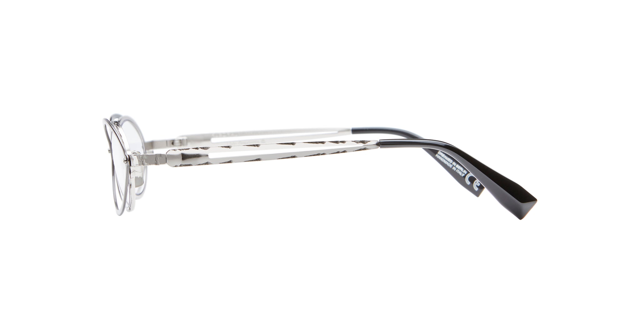 Side view of Kuboraum H18 clear round eyeglasses with patterned transparent arms and black tips, displayed on a white background.