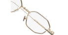 Close-up of KUBORAUM H66 geometric eyeglasses, gold frame, blue light lenses, adjustable nose pads, front angle.