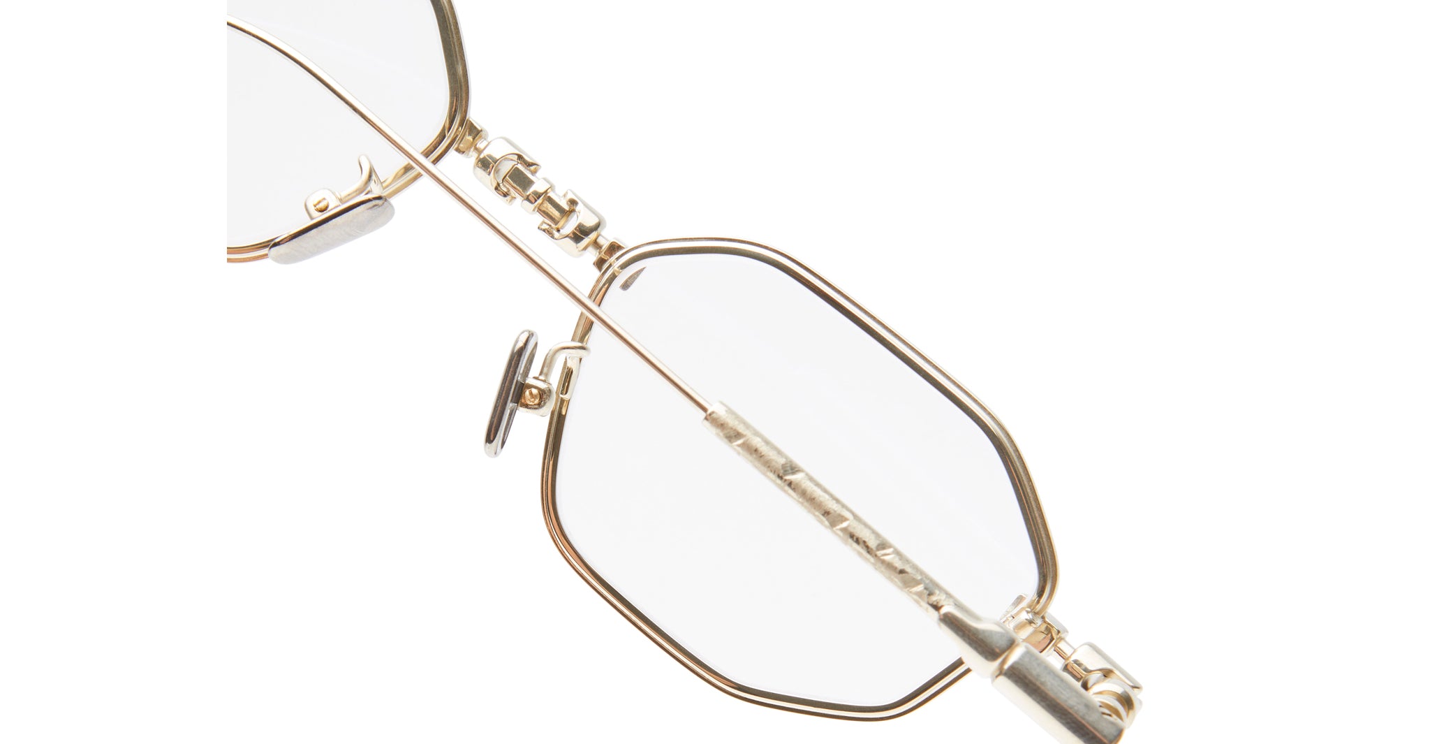 Close-up of KUBORAUM H66 geometric eyeglasses, gold frame, blue light lenses, adjustable nose pads, front angle.