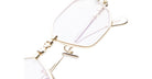 Close-up of KUBORAUM H66 gold titanium eyeglasses with clear lenses, featuring minimalist design, viewed from the front.
