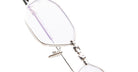 Close-up view of KUBORAUM H66 silver eyeglasses, showing oval lenses, visible hinge, and minimalist frame design.