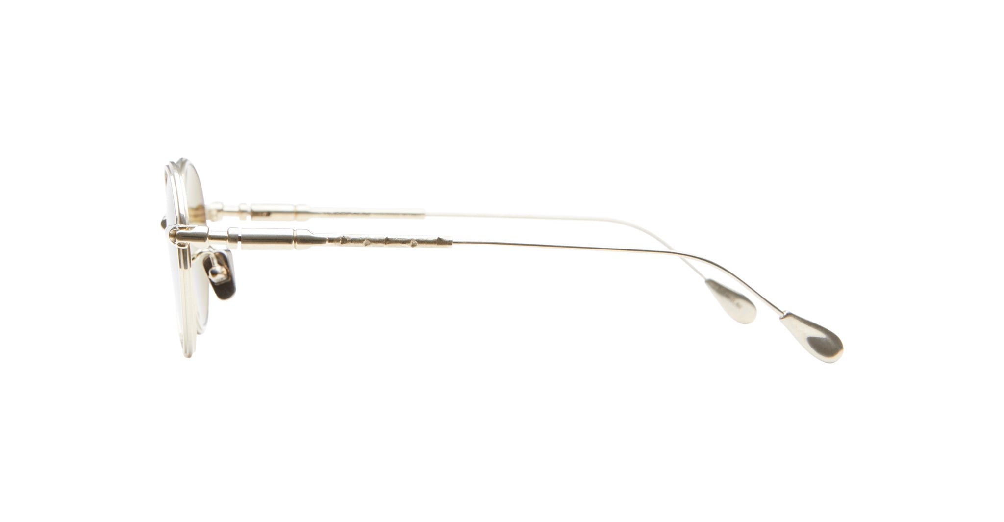 Side view of Kuboraum H67 eyeglasses  featuring thin gold frames and clear lenses.
