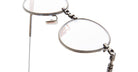 Close-up of Kuboraum H67 metal-frame eyeglasses with clear lenses, front angle view.