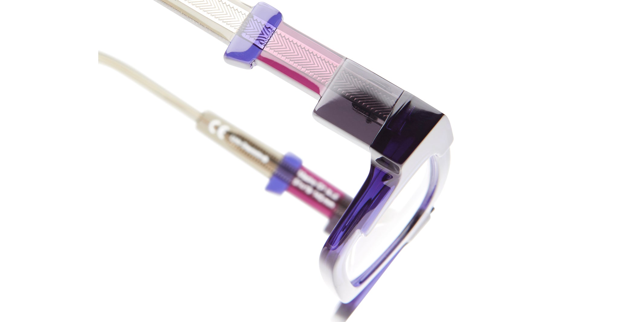 Close-up of KUBORAUM I01 eyeglasses frame showing purple, pink, and clear accents. Front angle highlights frame details.