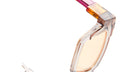 Close-up of KUBORAUM I01 eyeglasses with translucent peach lenses and gradient frames, front view.