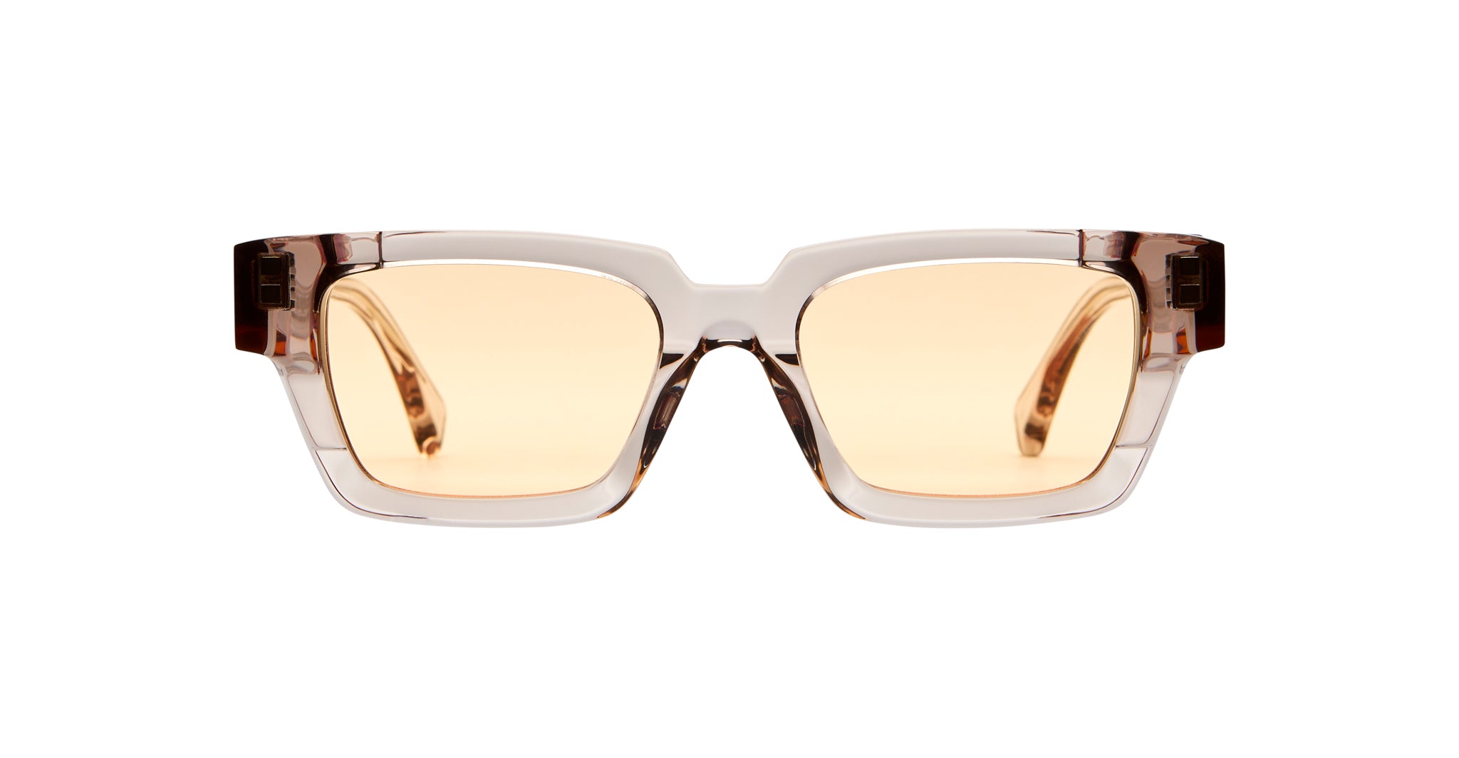 Kuboraum I01 eyeglasses by KUBORAUM, front view, rectangular translucent brown frame with amber blue-light-filter lenses.