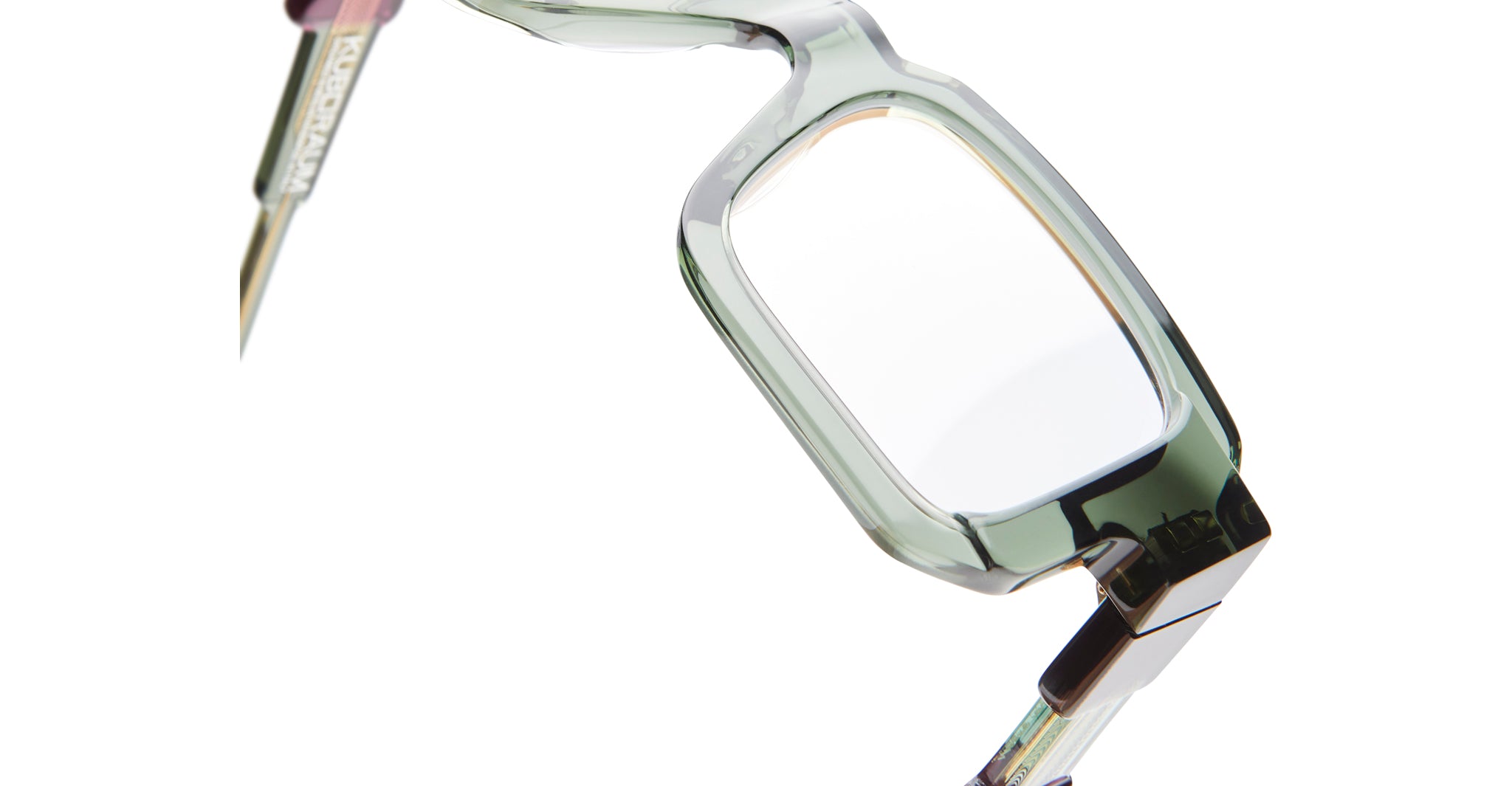 Close-up of KUBORAUM I03 transparent green rectangular eyeglass frames, front view.
