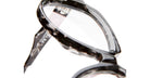 Close-up view of Kuboraum K37 eyeglasses featuring black and white tortoiseshell frames, set against a white background.