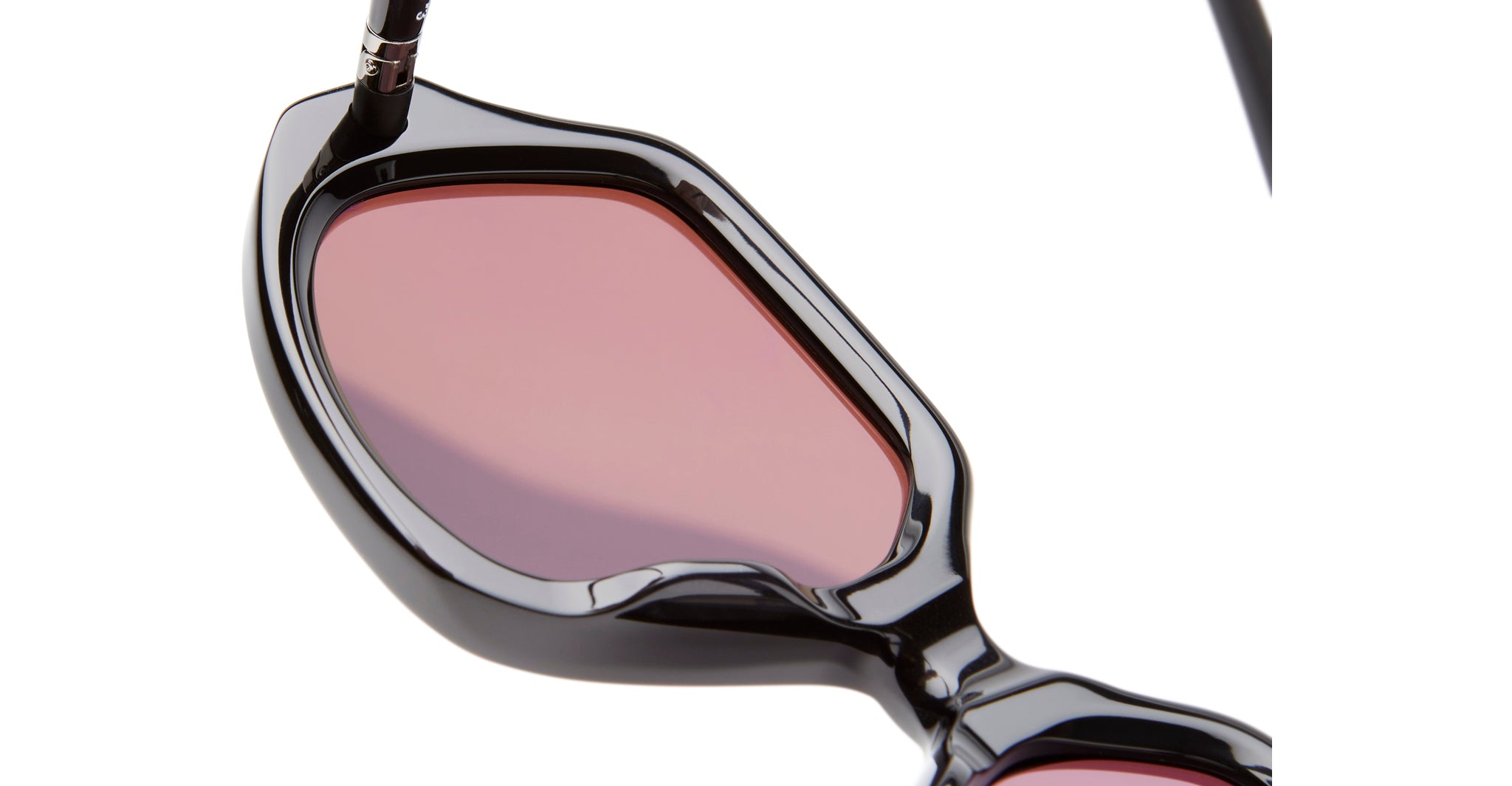 Kuboraum P20 sunglasses by KUBORAUM, black frames with pink lenses, front angle view.