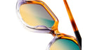 Close-up of KUBORAUM Kuboraum P20 sunglasses showing orange-clear frames and gradient lenses, front angle.