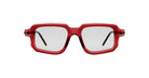 Kuboraum P23 bold square eyeglasses feature translucent red frames and clear lenses, seen from the front. The black temples are partially visible.