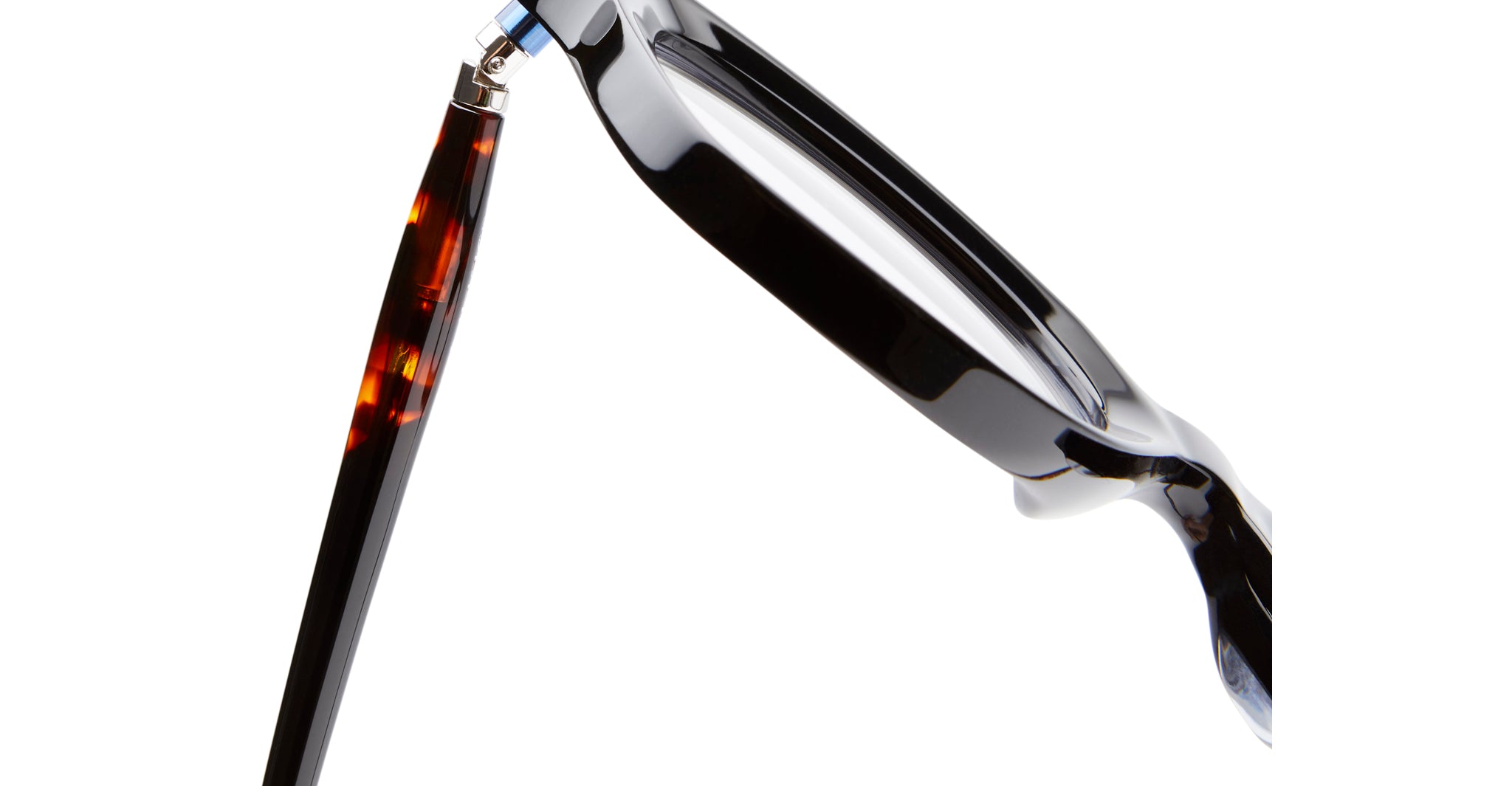 Close-up of KUBORAUM P28 eyeglasses, acetate frame with black front and tortoiseshell arm, side view.