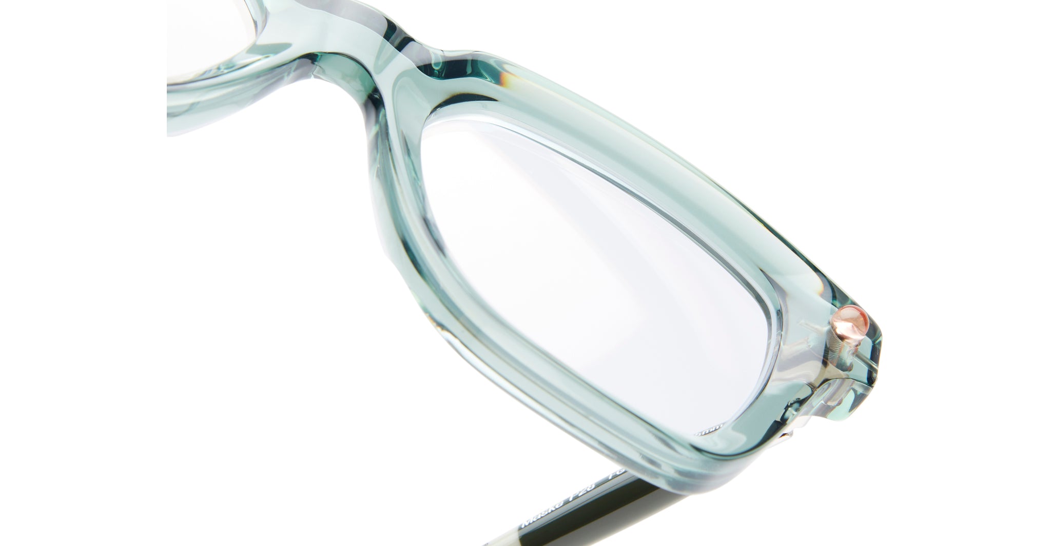 Close-up of KUBORAUM P28 translucent light green eyeglasses frame with clear lenses, front view.