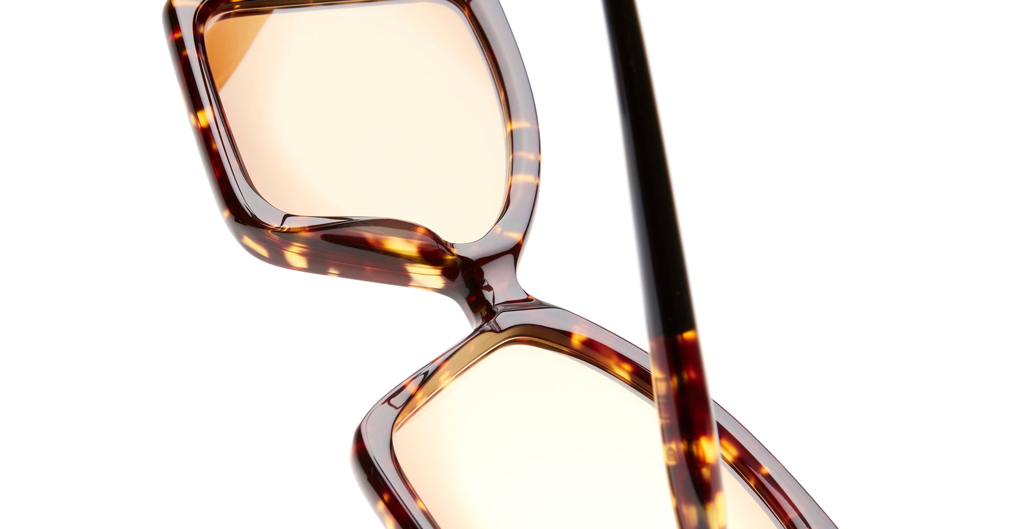 Close-up of KUBORAUM P30 tortoiseshell square sunglasses with UV-protective light brown lenses, front angle view.