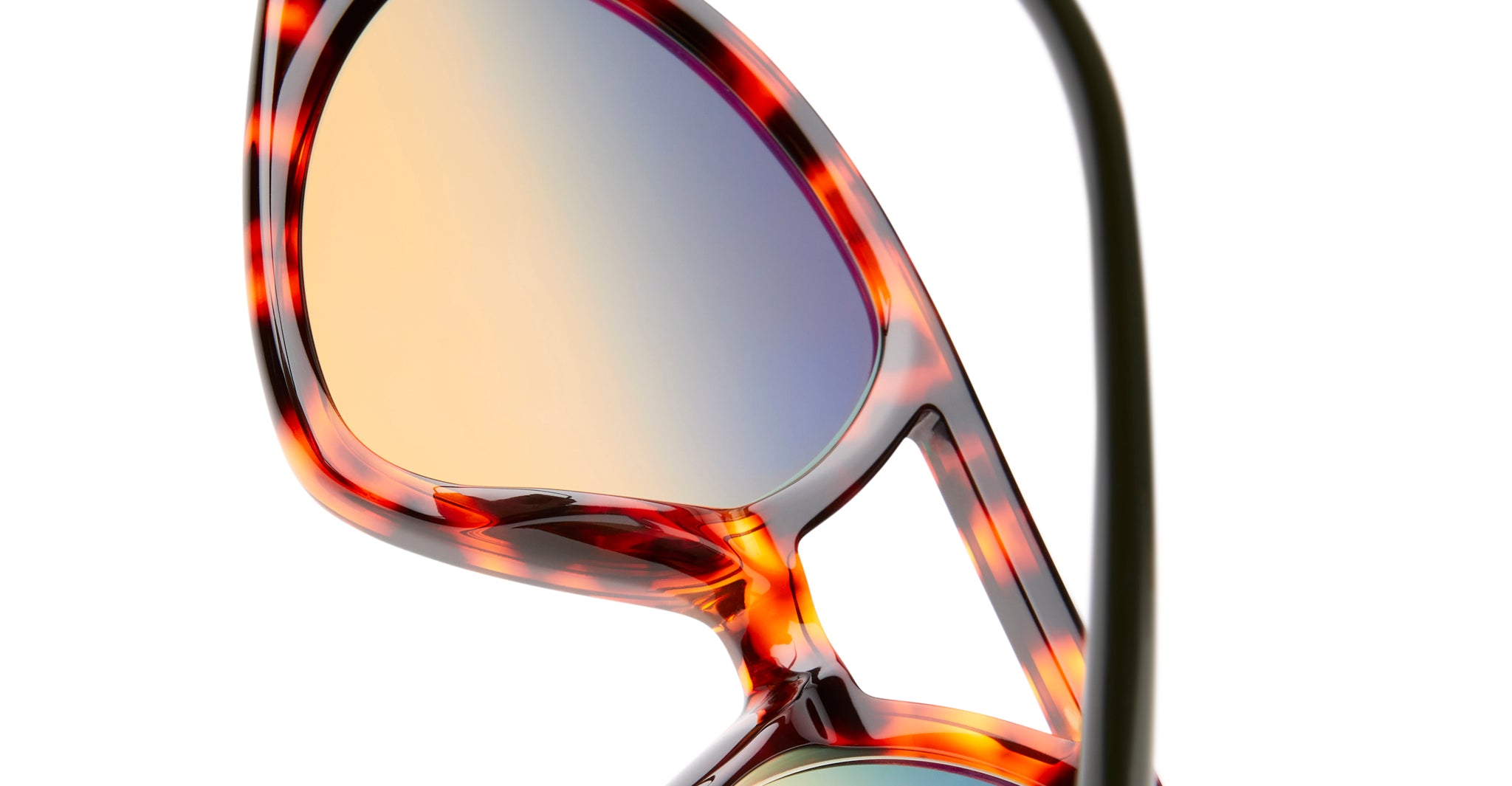 Closeup of KUBORAUM P31 tortoiseshell sunglasses with mirrored polarized lenses, front-facing view.