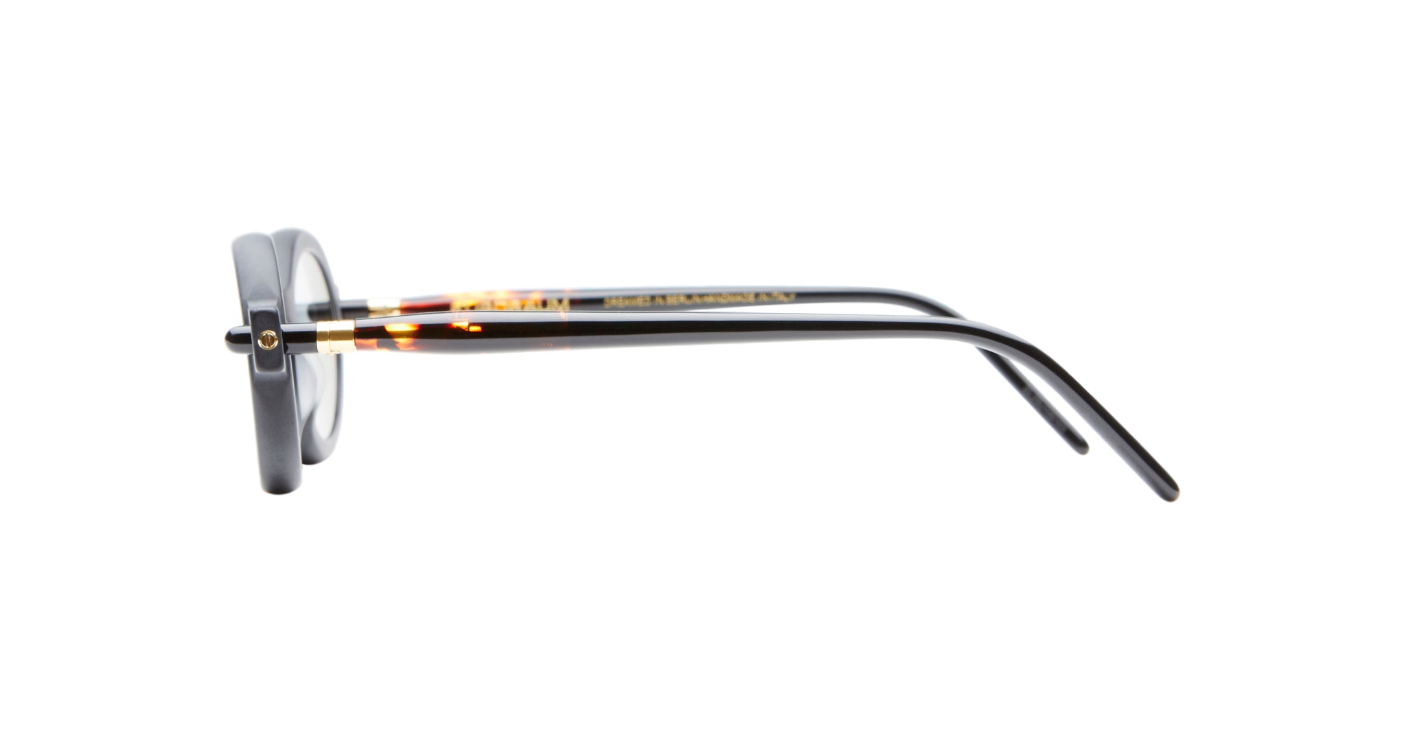 Side view of Kuboraum P6 black rectangular eyeglass frames with tortoiseshell detailing on the arms, shown against a white background.