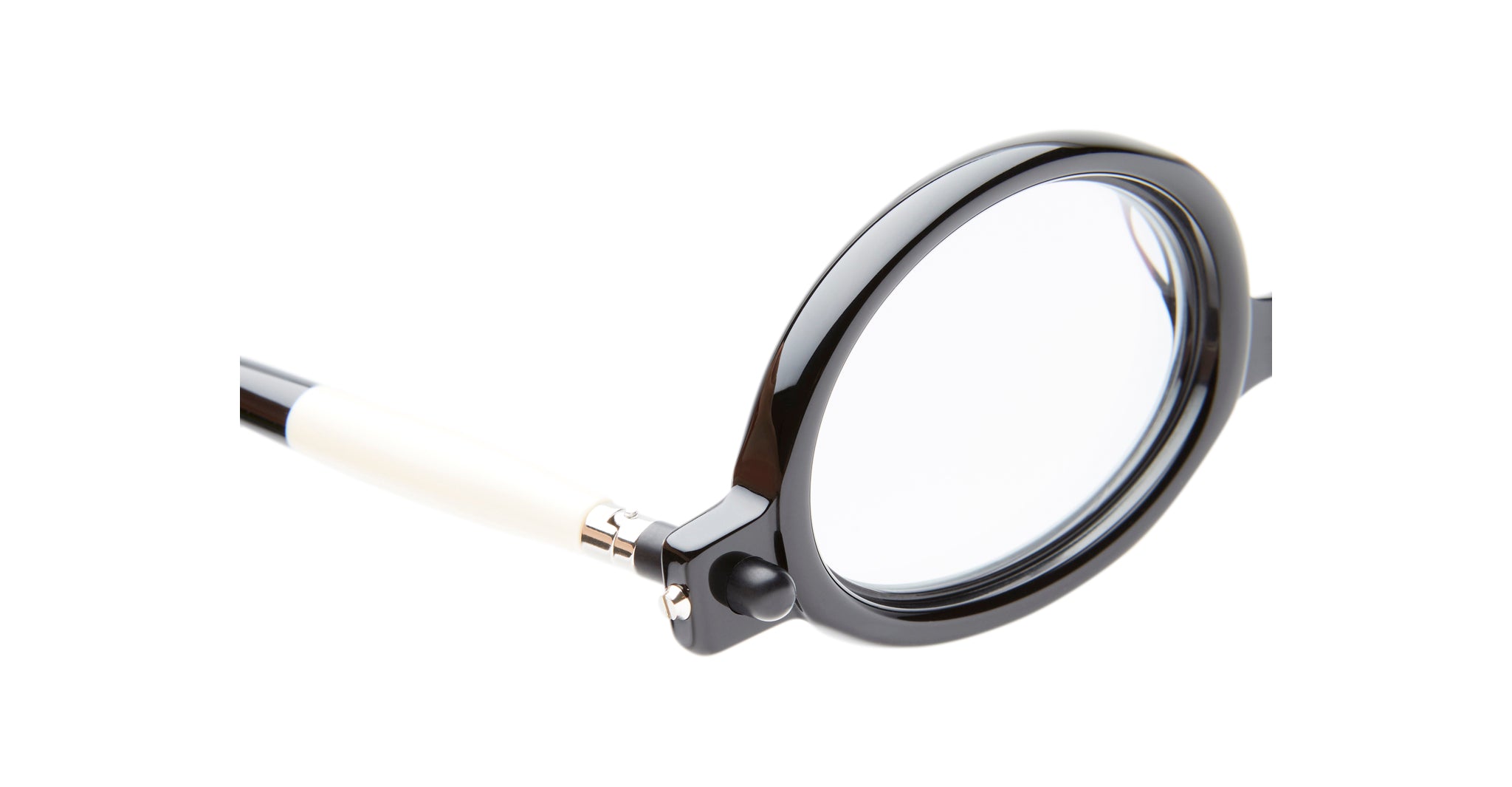 A close-up of the Kuboraum P6 eyeglasses shows a black frame with a white temple arm, isolated on a white background.