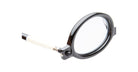 A close-up of the Kuboraum P6 eyeglasses shows a black frame with a white temple arm, isolated on a white background.