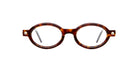 The Kuboraum P6 features round, tortoiseshell eyeglass frames with clear lenses and thin arms, shown on a white background.