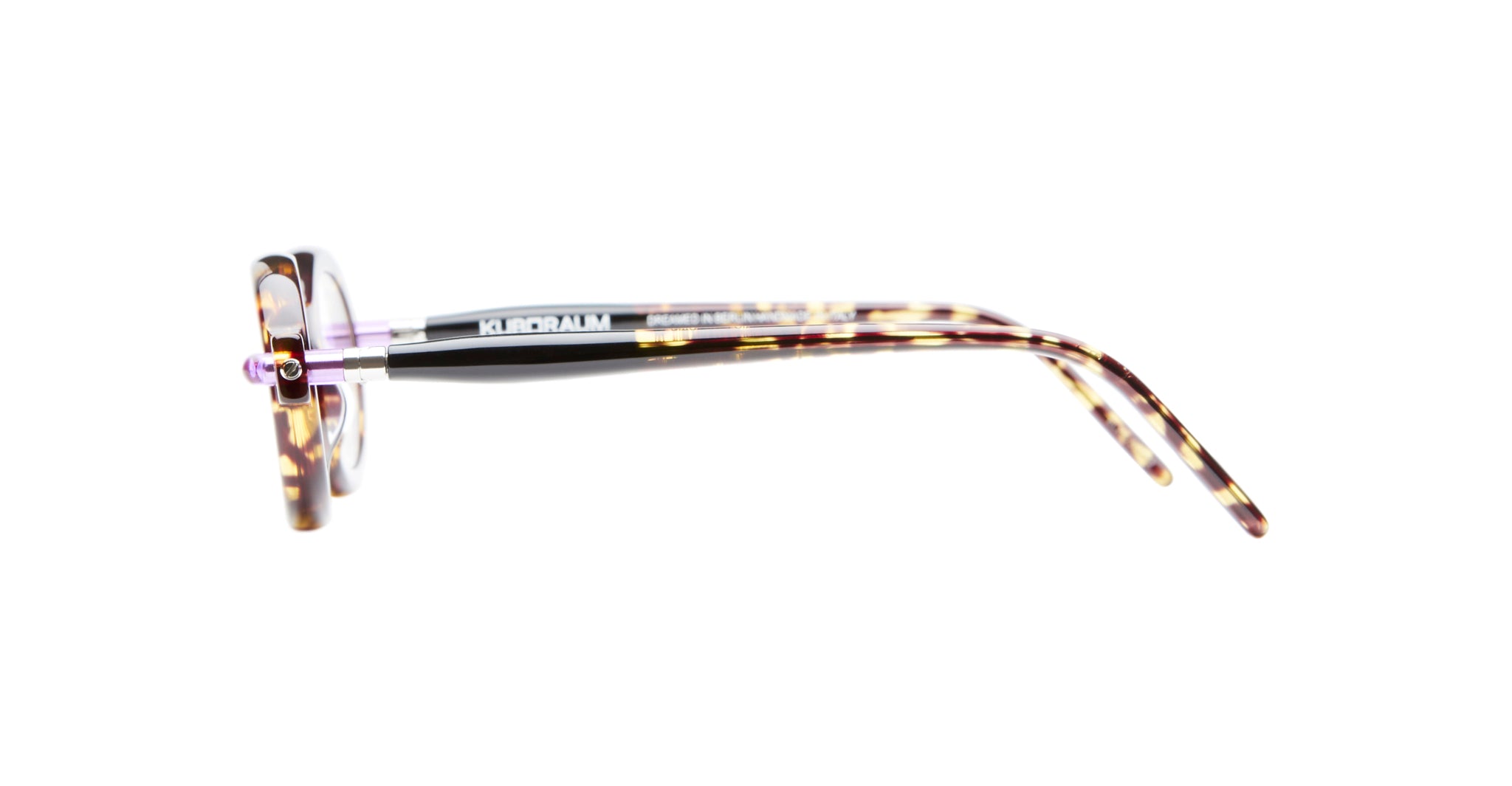 Side view of Kuboraum P6 eyeglasses featuring a translucent, tortoiseshell-patterned frame with “KUBORAUM” on the temple, set against a plain white background.