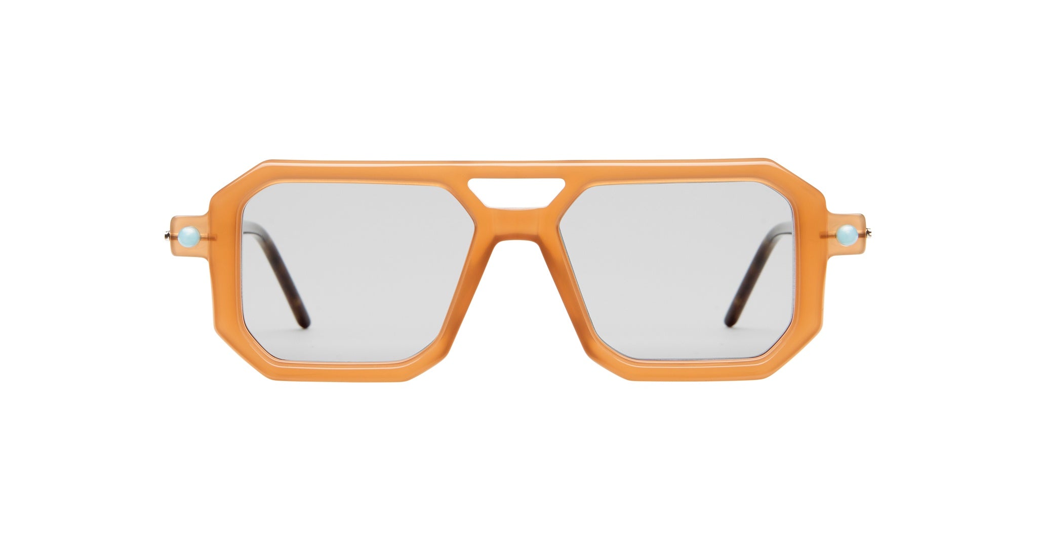 Kuboraum P8 sunglasses by KUBORAUM, shown from the front, featuring orange geometric frames and silver-tinted lenses.