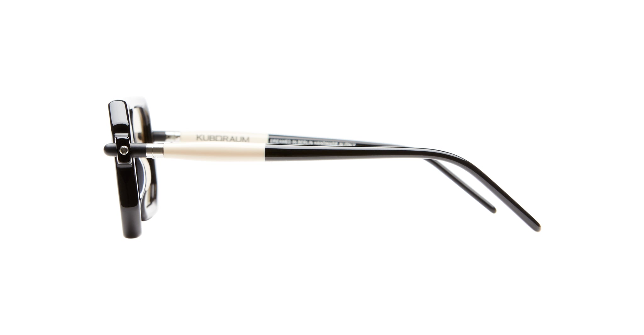 Kuboraum P8 eyeglasses by KUBORAUM in black and cream acetate, side view showing frame details.