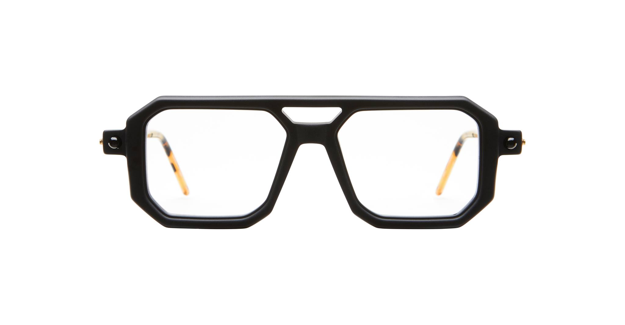 Kuboraum P8 eyeglasses with black geometric frames, clear lenses, and tortoiseshell arms shown from a front angle.